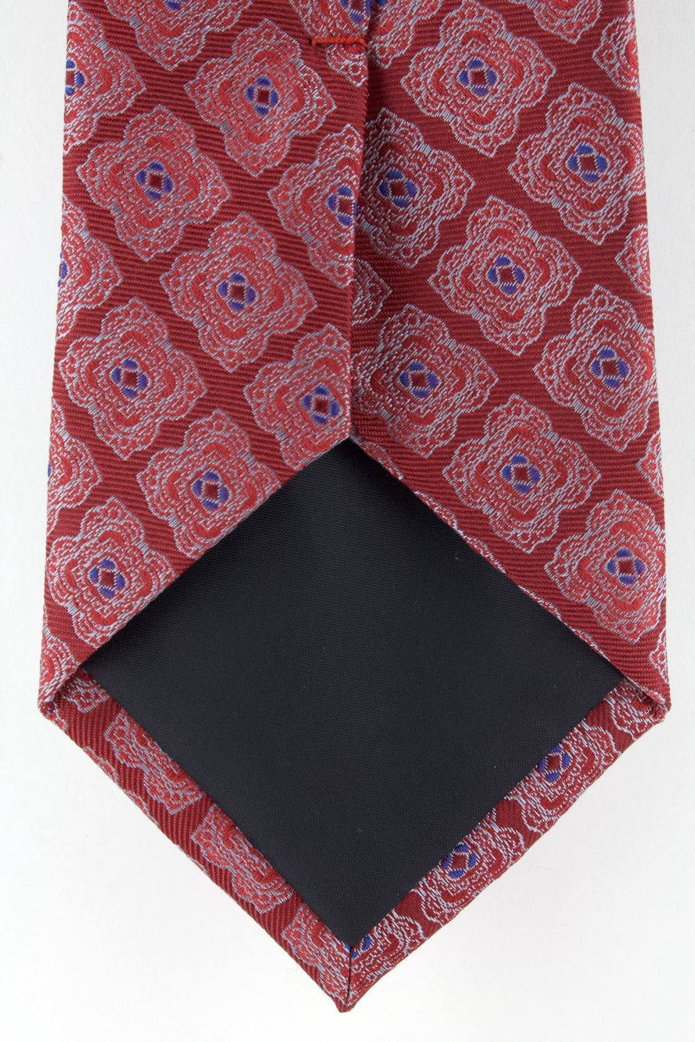 Cravate en soie tissée rouge motif fleur