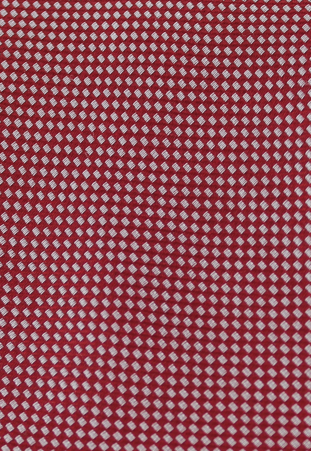 Cravate rouge à motifs blancs