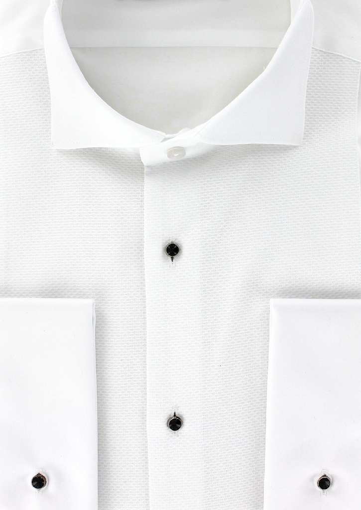 Une Chemise Blanche Accrochée à Un Cintre Avec Une Cravate Noire Accrochée  Dessus.