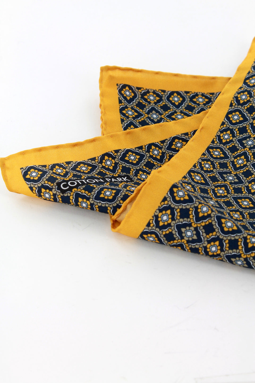 Pochette soie jaune à motifs bleu marine