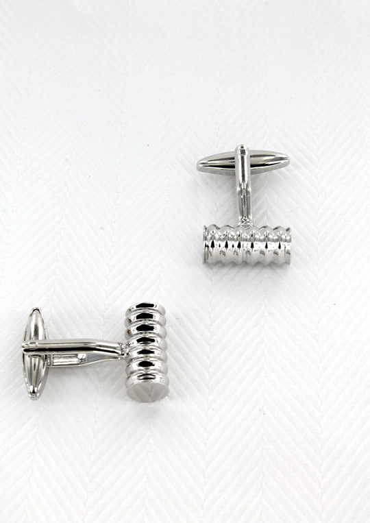 Cylindrical cufflinks with silver metal patterns 