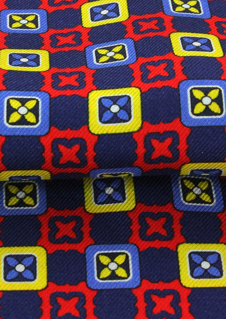 Foulard ascot en soie bleu royal motifs jaunes et rouges