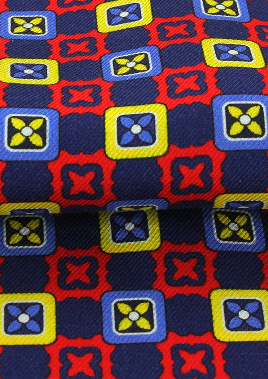 Foulard ascot en soie bleu royal motifs jaunes et rouges