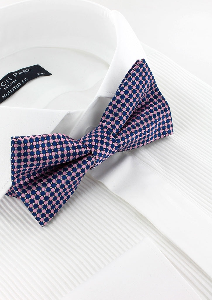 Noeud papillon bleu marine motifs géométriques rose