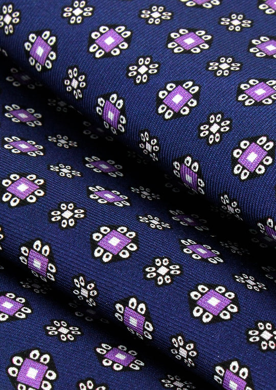 Pochette de costume en soie bleu marine à motifs parme