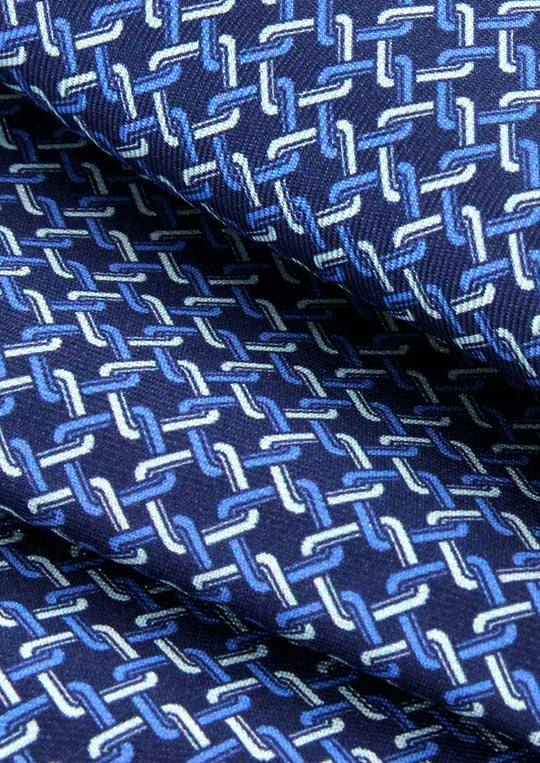 Pochette de costume en soie bleu marine à motifs bleu ciel