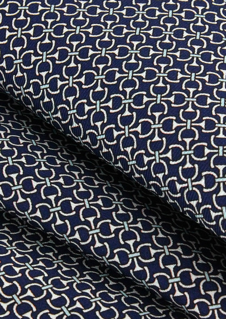 Pochette de costume en soie bleu marine à motifs blancs