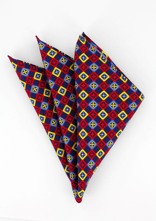 Pochette de costume en soie bleu marine à motifs rouge et jaune