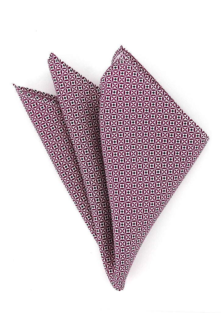 Pochette de costume en soie fuchsia à motifs géométriques noirs