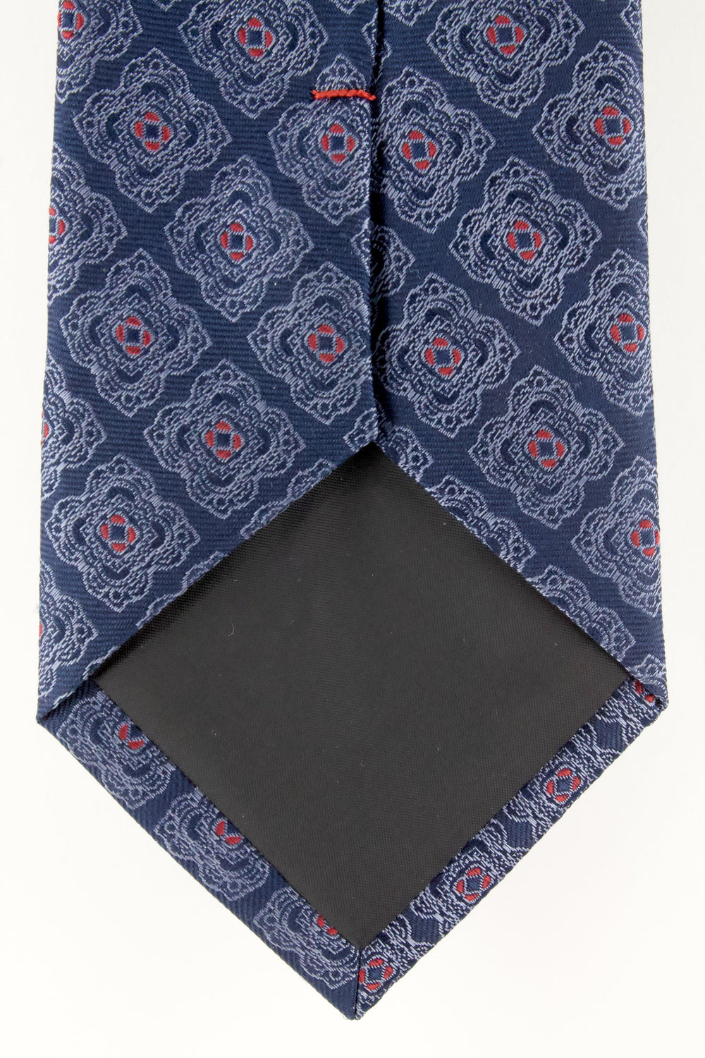 Cravate en soie tissée marine motif fleur