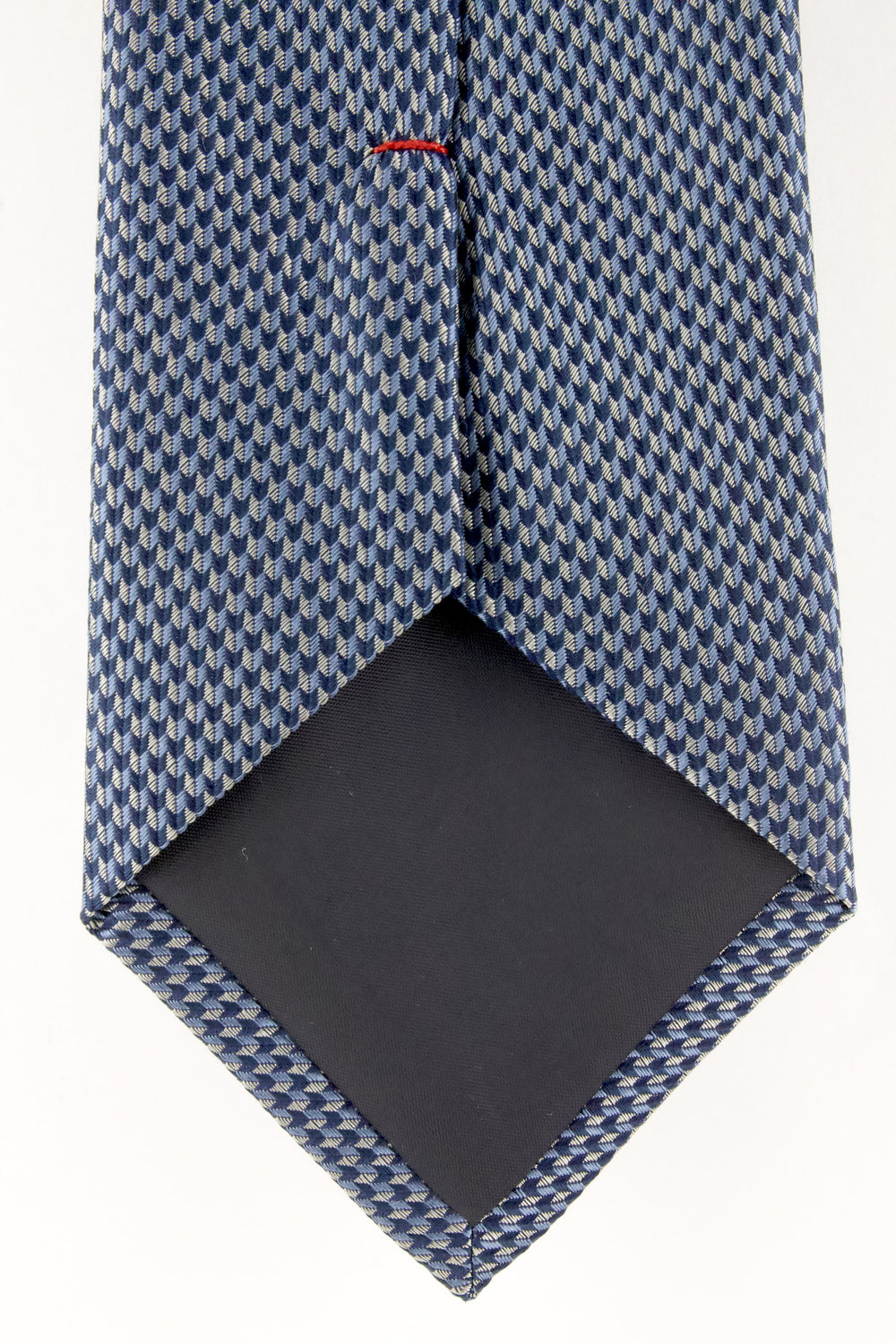 Cravate en soie tissée motif flèche 3D bleue