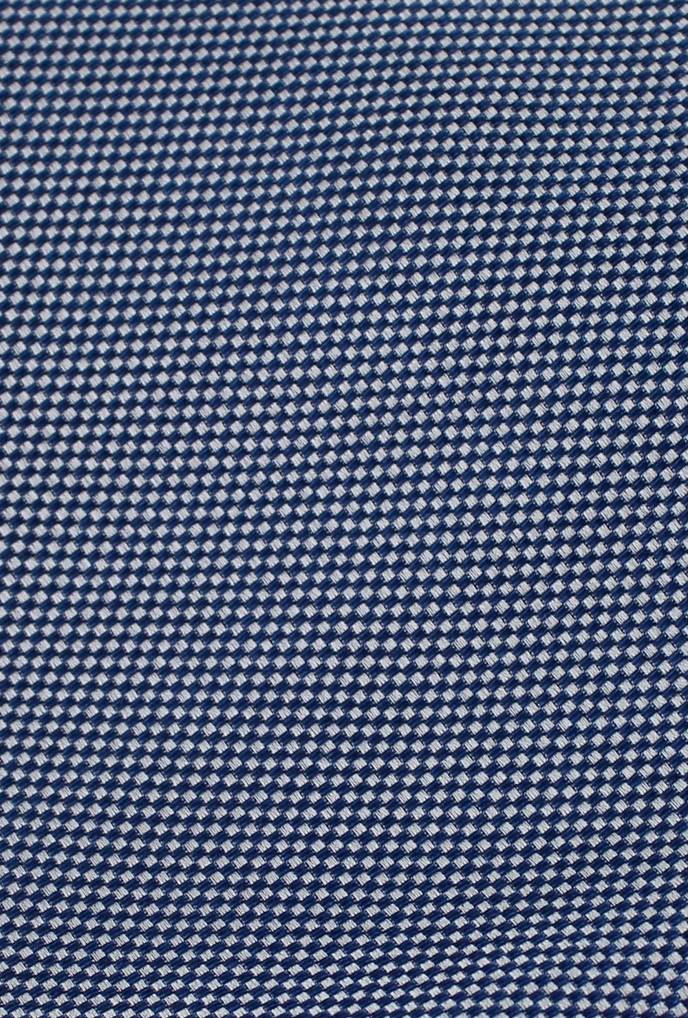 Navy blue tie with white patterns