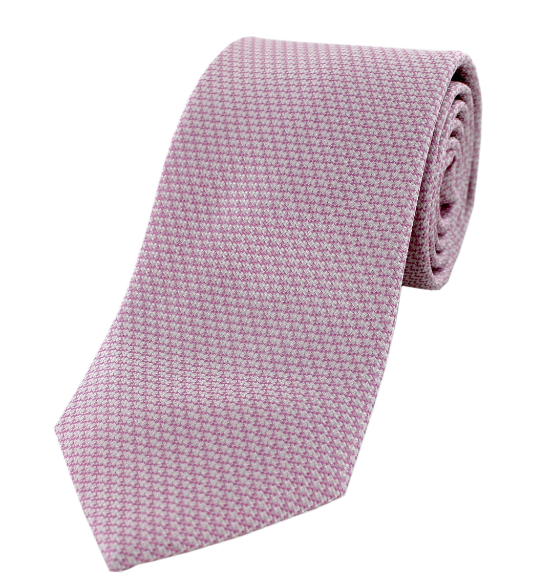 Pink tie with white patterns