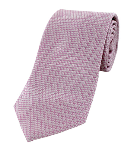 Cravate rose à motifs blancs
