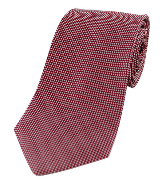 Red tie with white patterns
