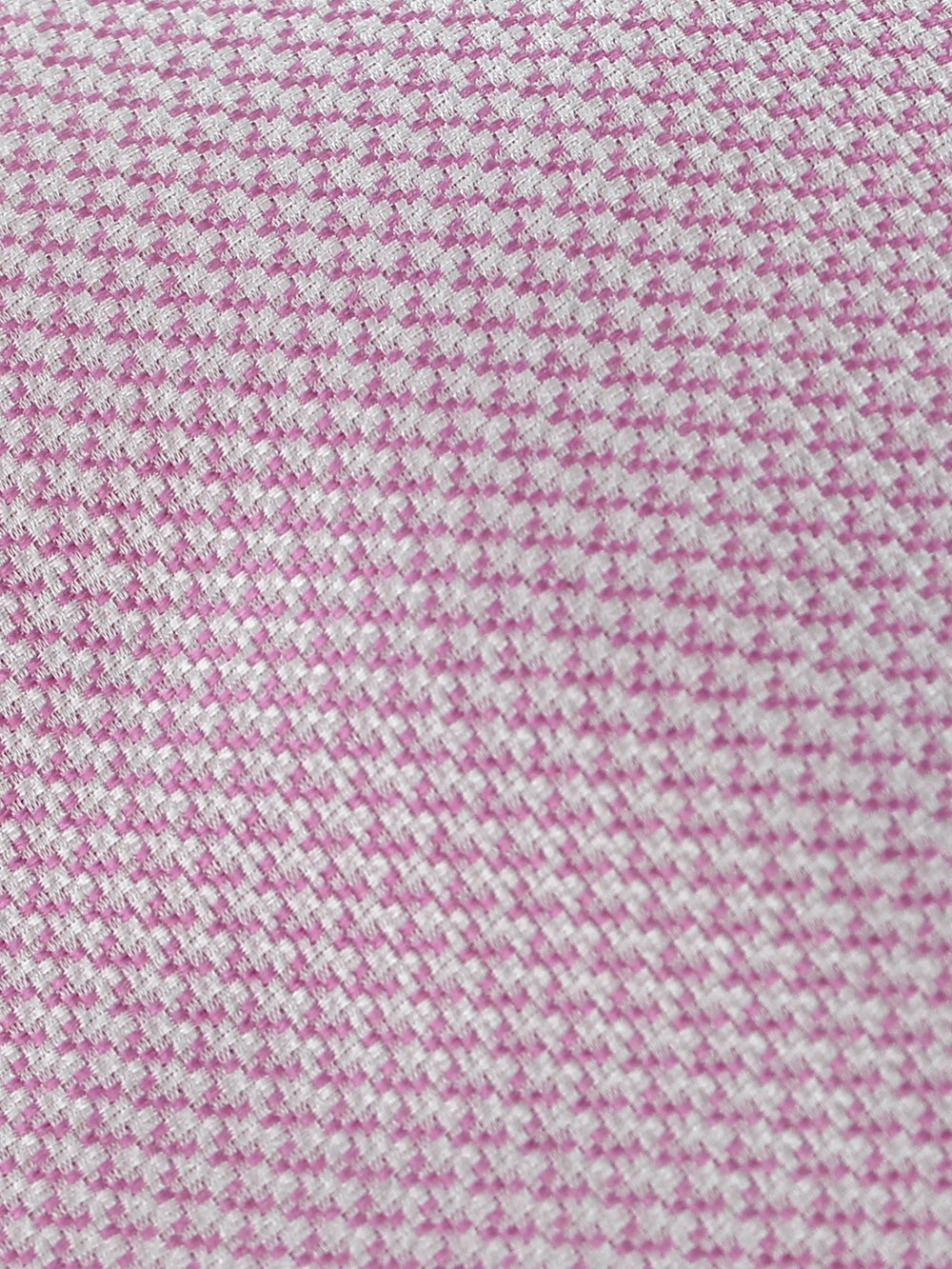 Pink tie with white patterns